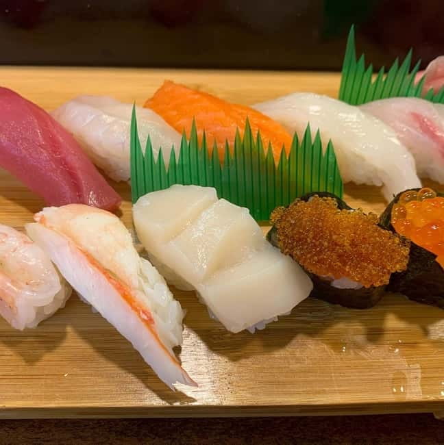 Authentic Sapporo: Nijo Market Seafood Lunch & History Tour - Walking beside the Sosei River