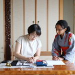 Calligraph Name in Japanese and Dress in Kimono - Learning the first calligraphy strokes