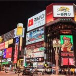 Exploring Hokkaido Nightlife Susukino Evening Walking Tour - The Nikka sign and Susukino’s glowing center