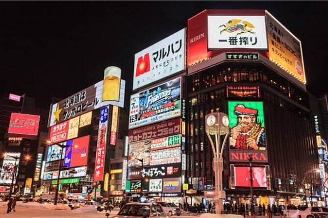 Exploring Hokkaido Nightlife Susukino Evening Walking Tour - The Nikka sign and Susukino’s glowing center