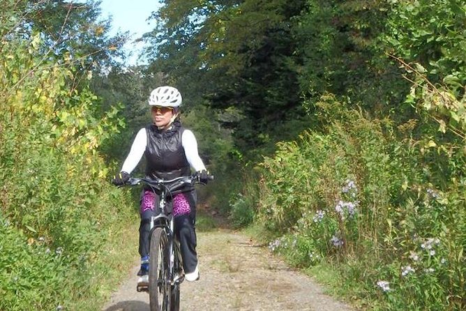 Nopporo Forest Mountain Bike Tour from Sapporo, presenting a retro Cycle cap - How the guide shapes the experience