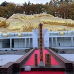 Sapporo: Buddha Hill, TV Tower, and Sake Stand Bar Tour - Butsugan-ji Temple and the roof-sized Nirvana Buddha